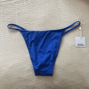 Monday swimwear blue bathing suit bottoms never worn. Still in packaging w/ tag